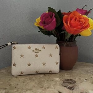 Coach Cream Wristlet with Gold Stars